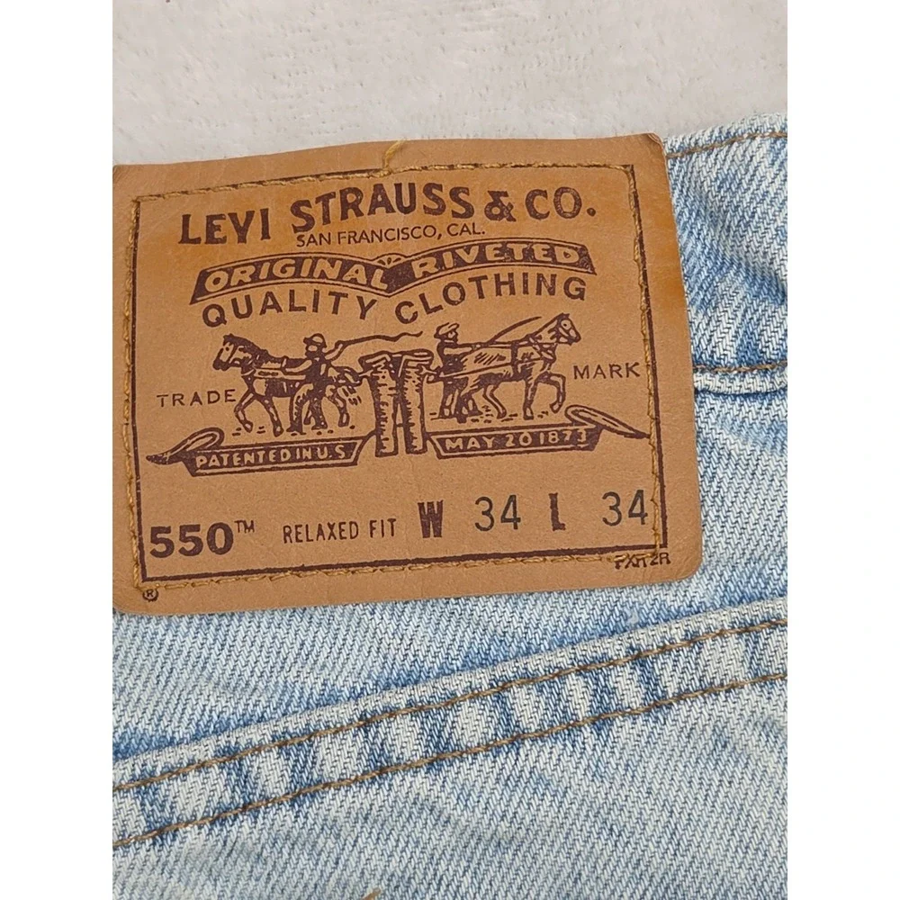 Vintage 90s Levi's 550 Jeans | Orange Tab‎ Light Wash | Relaxed Tapered | 34x34
